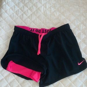 Nike size Medium Black shorts with hot pink built in bike shorts